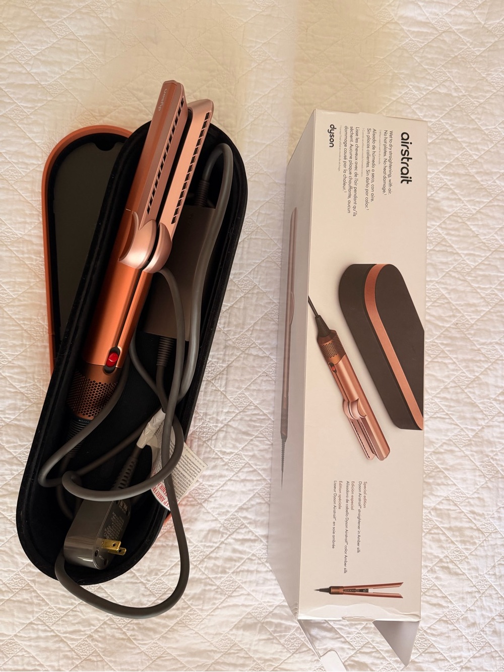 Like new Dyson Airstrait with original packaging and storage box